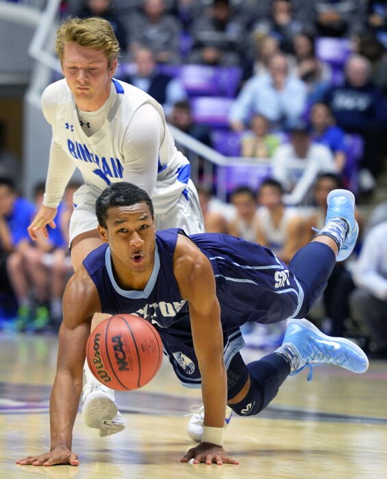 Steve Griffin  |  The Salt Lake TribuneLayton's Julian Blackmon dives for the ball ahead of Bingham's MIchael Green (15)  during quarterfinals of the boy's 5A basketball state tournament game at the Dee Event Center in Ogden, Wednesday, February 25, 2015. 