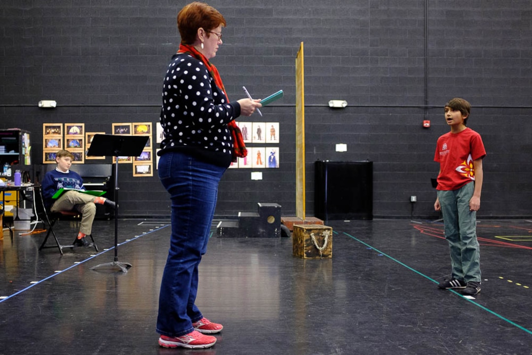 (Trent Nelson | The Salt Lake Tribune)  Rehearsal for Utah Opera's The Little Prince, with director Tara Faircloth, left, and 11-year-old Nitai Fluchel in the title role of the Little Prince. In Salt Lake City on Friday Dec. 7, 2018.