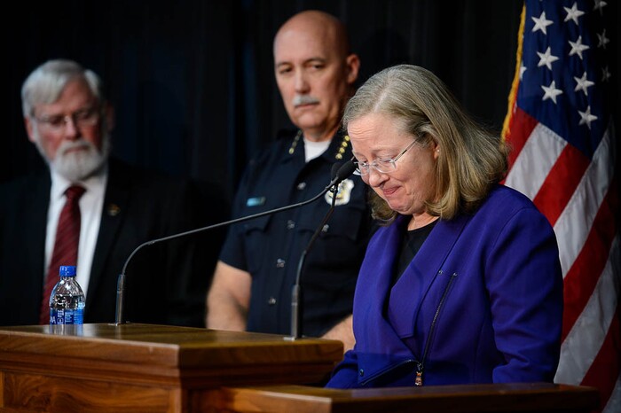 (Trent Nelson | The Salt Lake Tribune)  University of Utah Dean of Students Lori McDonald speaks about a slain student, ChenWei Guo, at a news conference where University of Utah officials and law enforcement provided an update on a shooting on campus and the current state of the police investigation, Tuesday October 31, 2017. At left is University of Utah President David W. Pershing and Salt Lake City Police Chief Mike Brown.