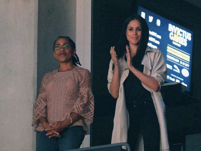 Meghan Markle, right, watches the closing ceremonies of the Invictus Games with her mother Doria Radlan in Toronto on Saturday, Sept. 30, 2017.  (Nathan Denette/The Canadian Press via AP)