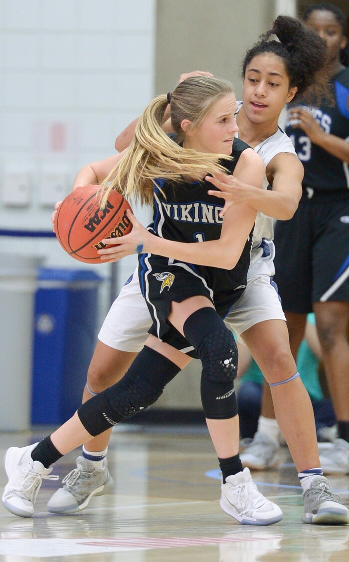 (Leah Hogsten  |  The Salt Lake Tribune)   Copper Hills High School girls' basketball team defeated Pleasant Grove High School 66-25 during their Class 6A girls' basketball playoff opener at Salt Lake Community College Tuesday, Feb. 20, 2018. 