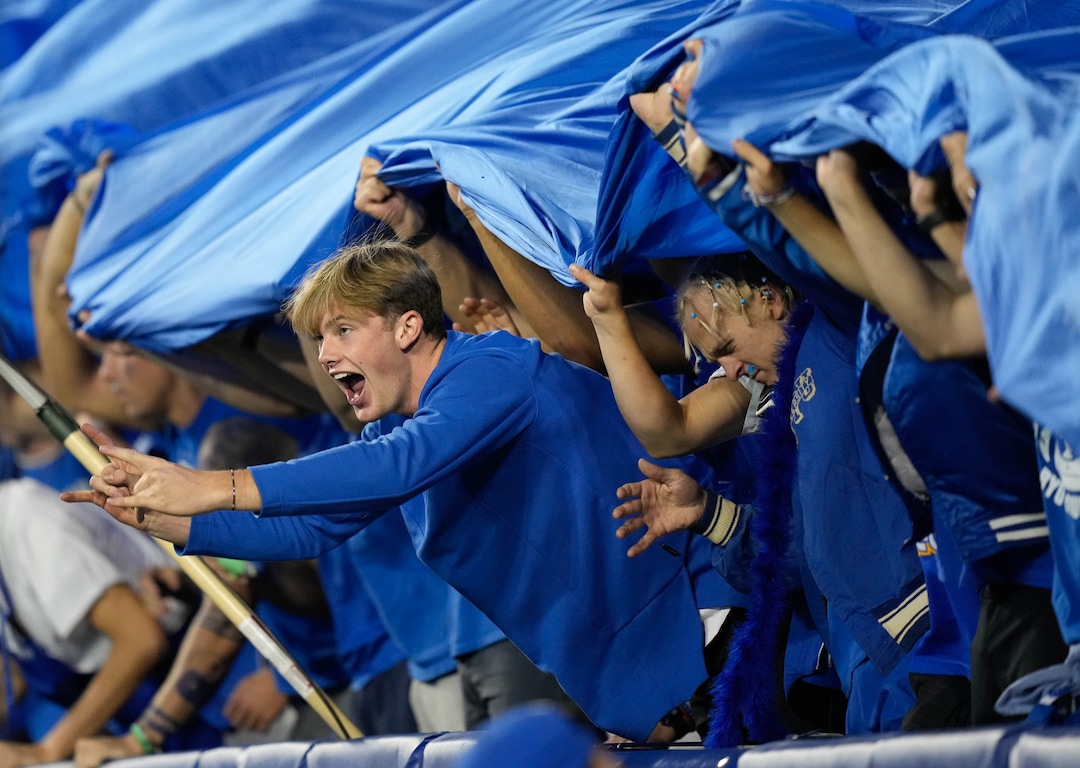 (Francisco Kjolseth | The Salt Lake Tribune) The student section drives up the decibel level during the game between the Brigham Young Cougars and the Wyoming Cowboys at LaVell Edwards Stadium in Provo, on Saturday, Sept. 24, 2022.