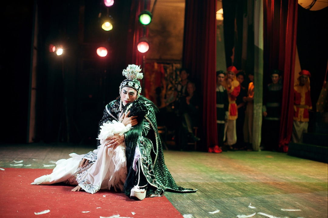 (Photo courtesy of Utah Film Center) Linh Phung (center, played by the one-named actor Isaac), a performer of Vietnamese folk opera, is one of the main characters in director Leon Le's romantic drama "Song Lang," which will screen in the Damn These Heels Queer Film Festival, online from July 10 to 19.