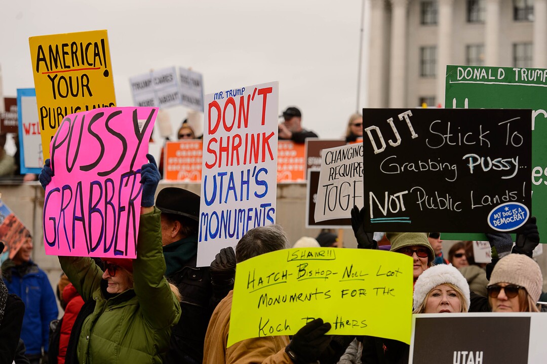 (Trent Nelson | The Salt Lake Tribune)  Protesters gather before a visit by President Donald Trump, Monday December 4, 2017.