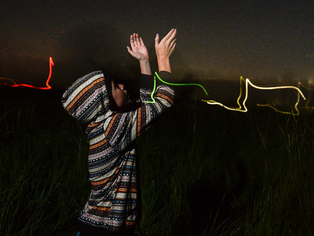 (Leah Hogsten  |  The Salt Lake Tribune)  A visitor to Thompson Century Farm tries to catch a firefly. Fireflies have been twinkling in the hay fields of Garcia's family farm near Spanish Fork, since her great-great-grandfather Samuel Thompson settled the farm in 1800s. The farm and its wet, marshy habitat is perfect for the fireflies' annual mating rituals every year, roughly from late May to early July. Garcia leads tours through her fields for free, simply to share in the experience and to educate others about fireflies, their short-lived lifecycle and what endangers their fragile habitat.
