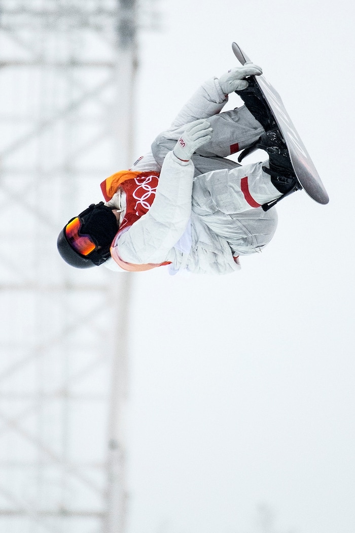 (Chris Detrick  |  The Salt Lake Tribune)  Shaun White competes during the men's halfpipe finals at Phoenix Snow Park during the Pyeongchang 2018 Winter Olympics Wednesday, Feb. 14, 2018.  White won the event with a 97.75, his third Olympic gold medal in the halfpipe (2006, 2010, 2018).