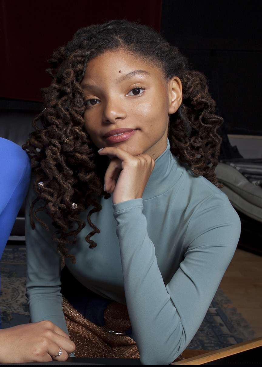 FILE - In this Dec. 22, 2017 file photo, Halle Bailey poses for a portrait at RMC Studio in Los Angeles. Bailey, half of the sister duo Chloe x Halle, will next be going under the sea, starring as Ariel in the upcoming adaptation of “The Little Mermaid.” The live-action version will include original songs from the 1989 animated hit as well as new tunes from original composer Alan Menken and “Hamilton” creator Lin-Manuel Miranda. (Photo by Rebecca Cabage/Invision/AP, File)