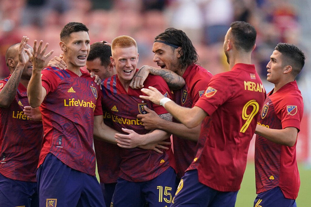 (Rick Bowmer | AP) Real Salt Lake midfielder Damir Kreilach, left, celebrates with teammates after scoring against the Vancouver Whitecaps during the first half of an MLS soccer match Wednesday, July 7, 2021, in Sandy.