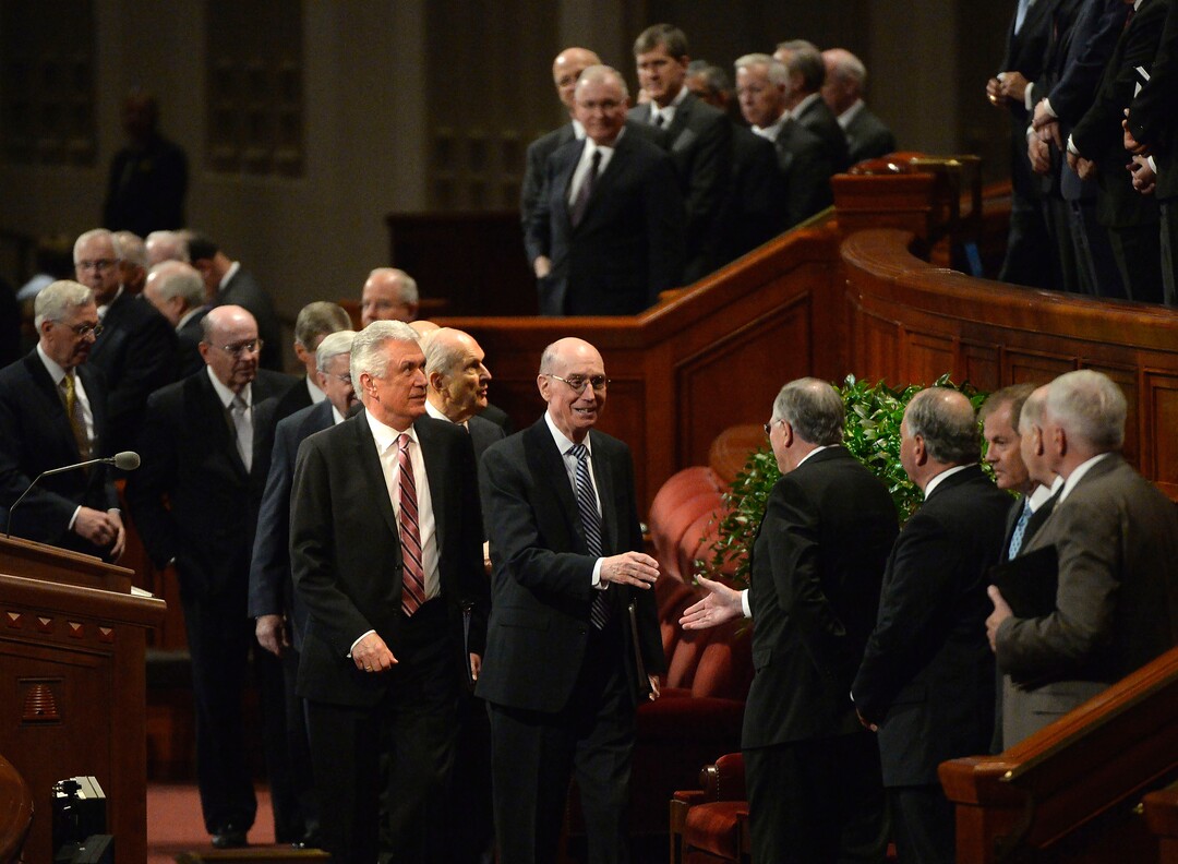 (Al Hartmann  |  The Salt Lake Tribune) 	President Henry Eyring, first counselor to the First Presidency, center, and President Dieter Uchtdorf, second counselor to the First Presidency, just behind, shake hands with the members of Qurom of the Twelve Apostles at concusion of the Sunday morning session of the LDS Church’s 187th Semiannual General Conference in Salt Lake City on Sunday Oct. 1, 2017.
