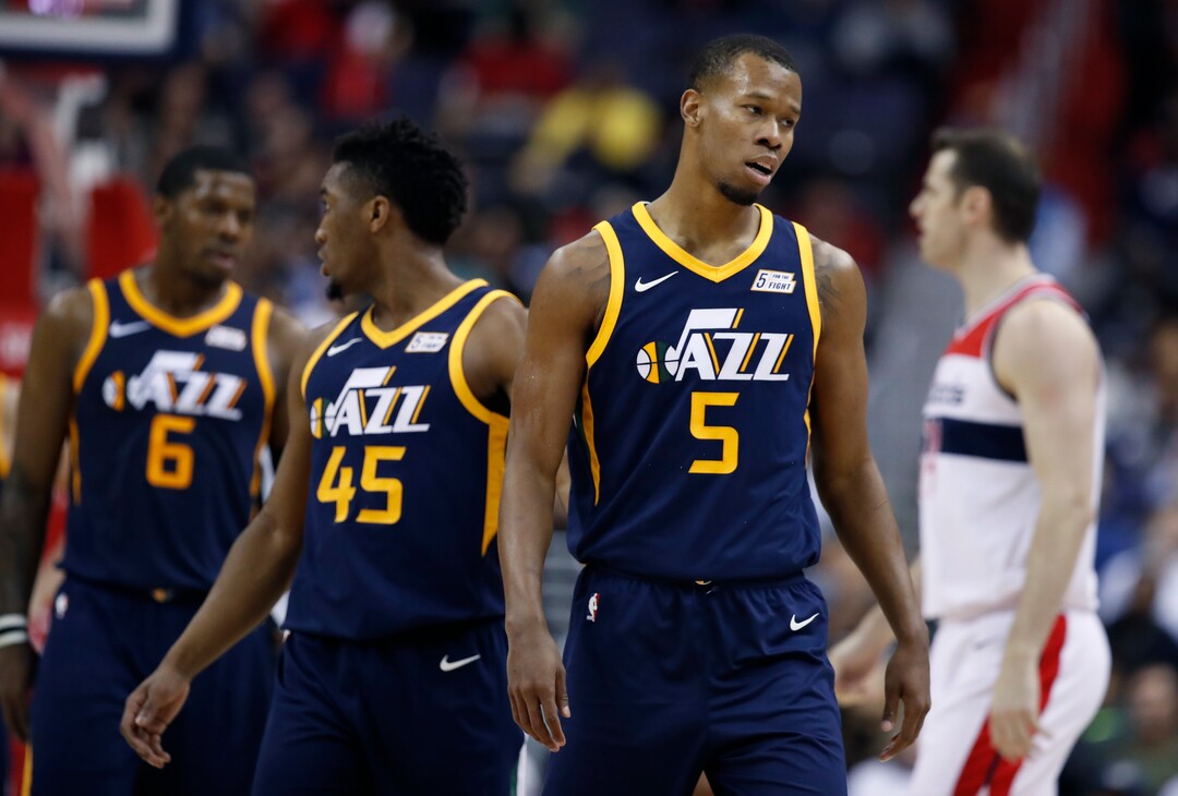Utah Jazz guard Rodney Hood (5) leaves the court after his second technical foul, forcing his ejection during the second half of an NBA basketball game against the Washington Wizards, Wednesday, Jan. 10, 2018, in Washington. The Jazz won 107-104. (AP Photo/Alex Brandon)