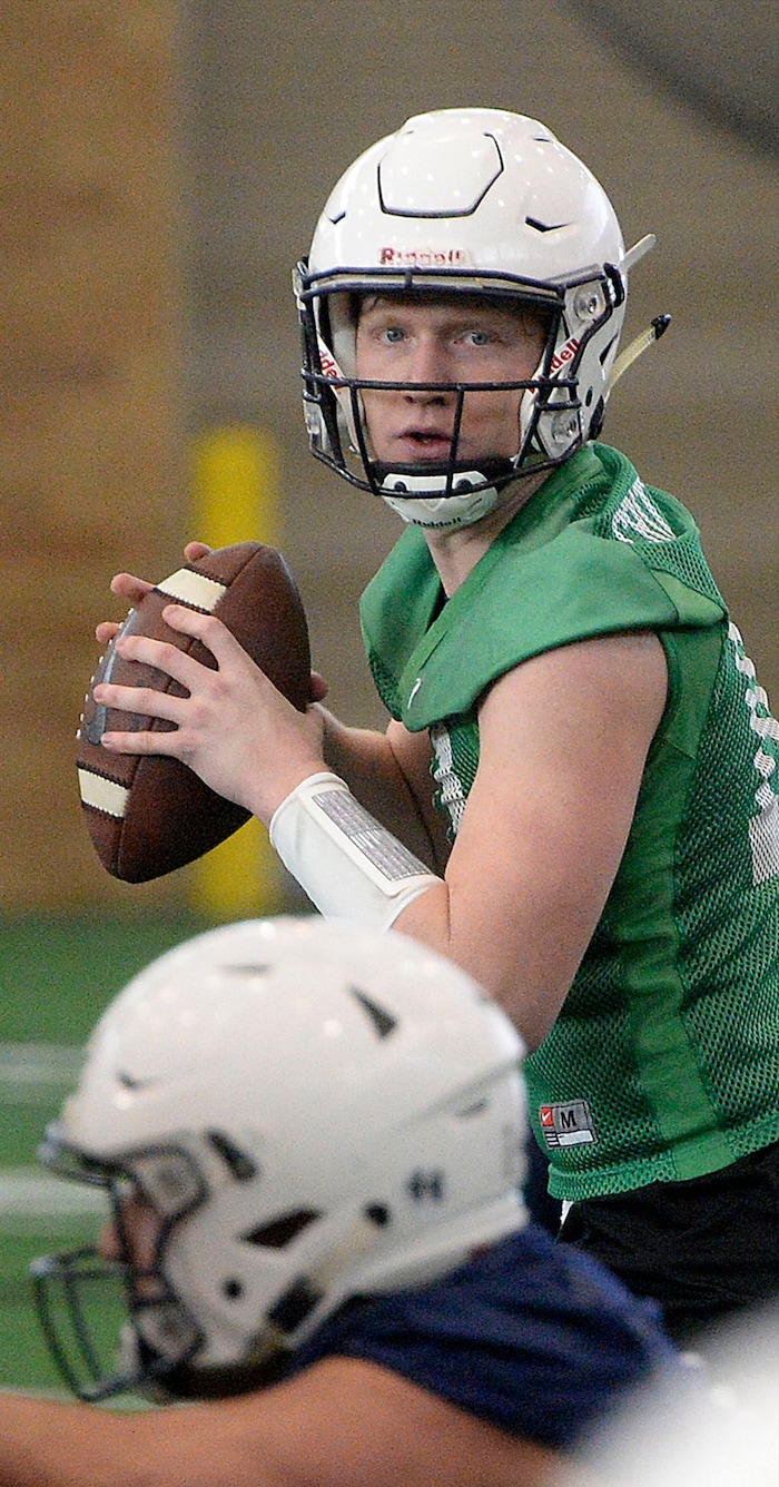 (Al Hartmann | The Salt Lake Tribune)
BYU opened spring football camp on Monday March 5 in the indoor playing facility. Quarterback Joe Critchlow takes his turn running the offense.