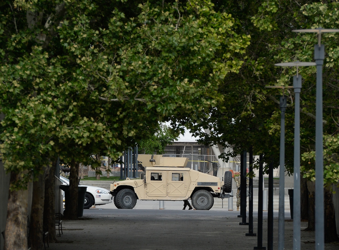 (Francisco Kjolseth  |  The Salt Lake Tribune) A National Guard Humvees is parked next to the Salt Lake City Public Safety Building as demonstrators protest against police brutality on Tuesday, June 2, 2020, in downtown Salt Lake City, as an 8 p.m. weeklong curfew remains in order.
