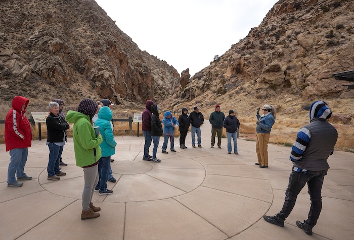 (Leah Hogsten | The Salt Lake Tribune) "Water, wind and sand carved out the walls of the Gap," said Nancy Dalton, a guide with the Parawon Heritage Foundation giving an interpretive talk Saturday, Mar. 20, 2021 at the Parowan Gap during the spring equinox observance.