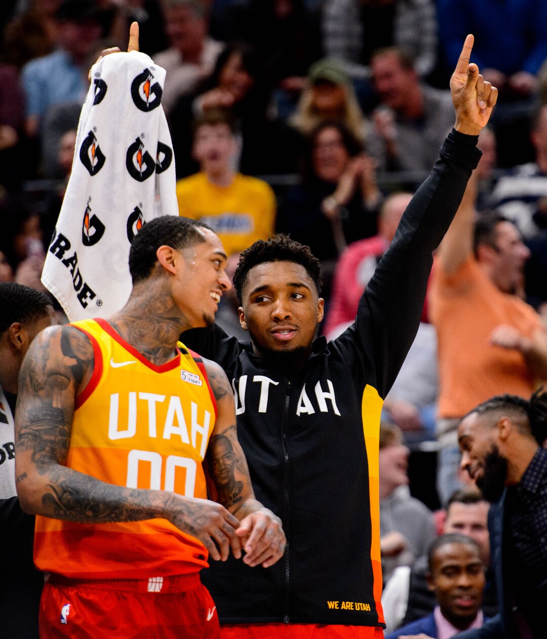(Trent Nelson  |  The Salt Lake Tribune) Utah Jazz guard Jordan Clarkson (00) and Utah Jazz guard Donovan Mitchell (45) celebrate free chicken as the Utah Jazz host the Charlotte Hornets, NBA basketball in Salt Lake City on Friday, Jan. 10, 2020.