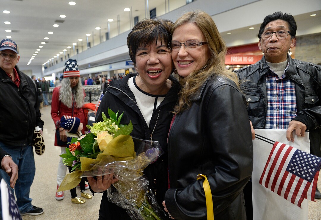 Scott Sommerdorf | The Salt Lake Tribune
Corazon Espinosa, left, poses for a photo with Jennifer Andelin, a senior advisor for Rep. John Curtis, after arriving from Australia, via Los Angeles, Thursday, March 1, 2018. Espinosa, 70, has been trying to legally immigrate to the U.S. for 40 years.