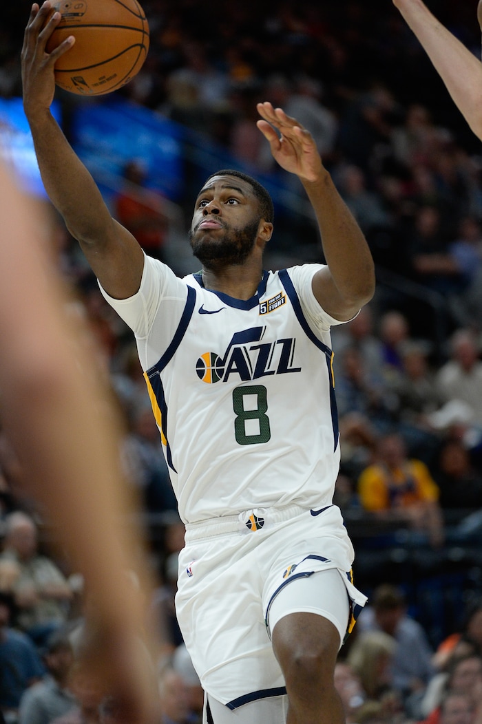 (Francisco Kjolseth  |  The Salt Lake Tribune)  Utah Jazz guard Emmanuel Mudiay (8) lays one up as the Utah Jazz host the Portland Trailblazers in their NBA basketball game at Vivint Smart Home Arena in Salt Lake City on Wed. Oct. 16, 2019.