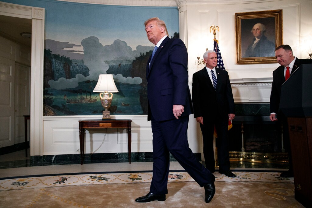 (Jacquelyn Martin | AP) President Donald Trump, left, followed by Vice President Mike Pence and Secretary of State Mike Pompeo, leaves the podium after speaking about the ceasefire in Syria with Turkey, Wednesday, Oct. 23, 2019, in the Diplomatic Room of the White House in Washington. The president was also joined by White House national security adviser Robert O'Brien.