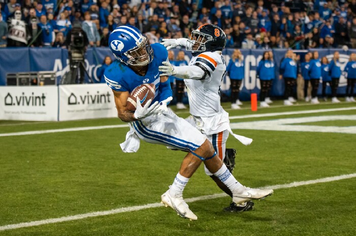 (Trevor Christensen | Special to The Tribune)
Brigham Young University’s Samson Nacua pulls in a catch for a touchdown against Virginia’s Darrius Bratton during the first half at LaVell Edwards Stadium on Saturday, Oct. 30, 2021, in Provo, Utah.