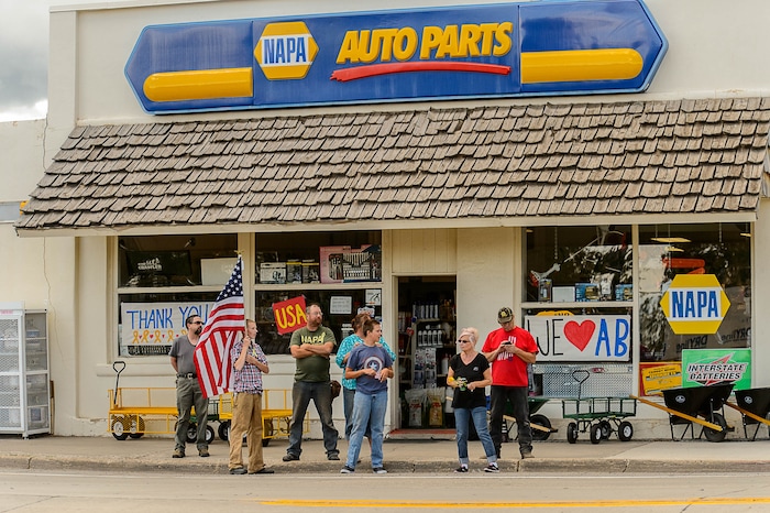 (Trent Nelson | The Salt Lake Tribune)  Crowds line Main Street in Monticello to honor the motorcade of fallen soldier Aaron Butler, who was killed last week in Afghanistan, , Thursday August 24, 2017.