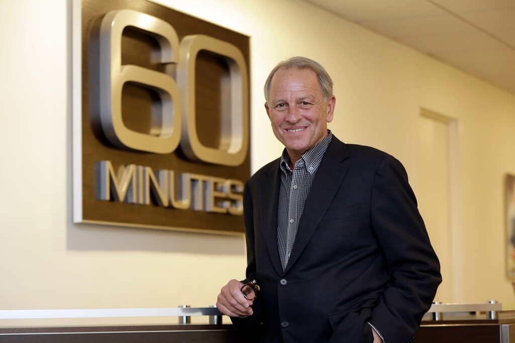 FILE - In a Tuesday, Sept. 12, 2017 file photo, "60 Minutes" Executive Producer Jeff Fager poses for a photo at the "60 Minutes" offices, in New York.  Fager  is delaying his return from vacation until a probe into sexual misconduct claims wraps up. CBS hired two outside law firms to investigate CEO Les Moonves after a New Yorker article published claims of sexual misconduct from six women spanning three decades. The article also contained allegations of inappropriate behavior by Fager. Fager has denied any wrongdoing. (AP Photo/Richard Drew, File)