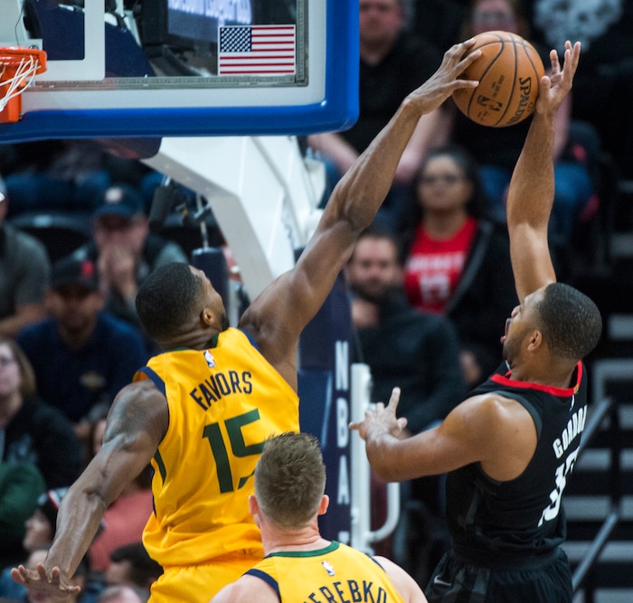 (Rick Egan  |  The Salt Lake Tribune)  Utah Jazz forward Derrick Favors (15) blocks a shot by  blocks a shot by Houston Rockets guard Eric Gordon (10), in NBA action, Utah Jazz vs Houston Rockets in Salt Lake City, Thursday, December 7, 2017.



