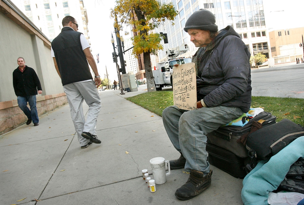 (Scott Sommerdorf  |  Tribune file photo)
A panhandler seeks help on the streets of Salt Lake City in 2009.