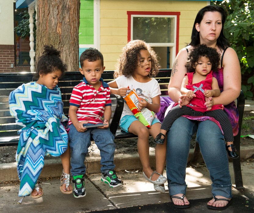 (Rick Egan  |  Tribune file photo)

Justina Shields, with her children, left to right, Laila, William, Maliha, and Averyonna, were among the last families moved out of the Road Home last July.
