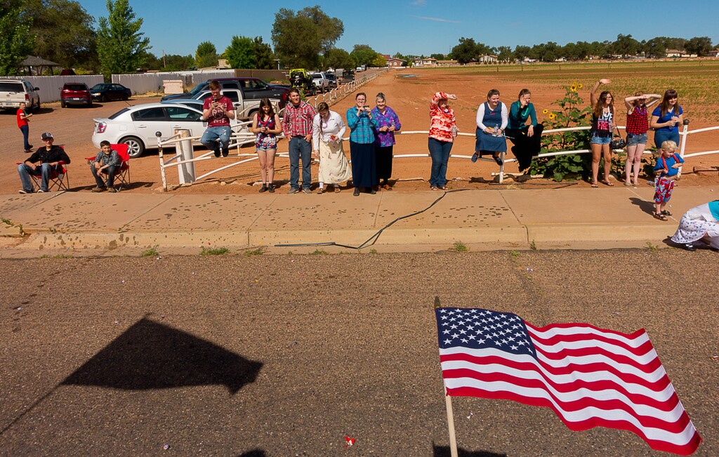 Trent Nelson  |  The Salt Lake TribuneOnlookers in a variety of dress line the sidewalk for the Colorado City and Hildale Fourth of July Parade in Hildale, UT, as part of an Independence Day celebration Saturday July 2, 2016.