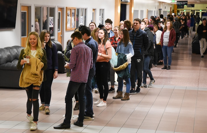 (Francisco Kjolseth  |  The Salt Lake Tribune)  Hundreds line up outside the ballroom at the Taggart Student Center at Utah State University recently to catch the school's first ever drag show. Filled to capacity, ten drag queens and kings entertained the friendly crowd.