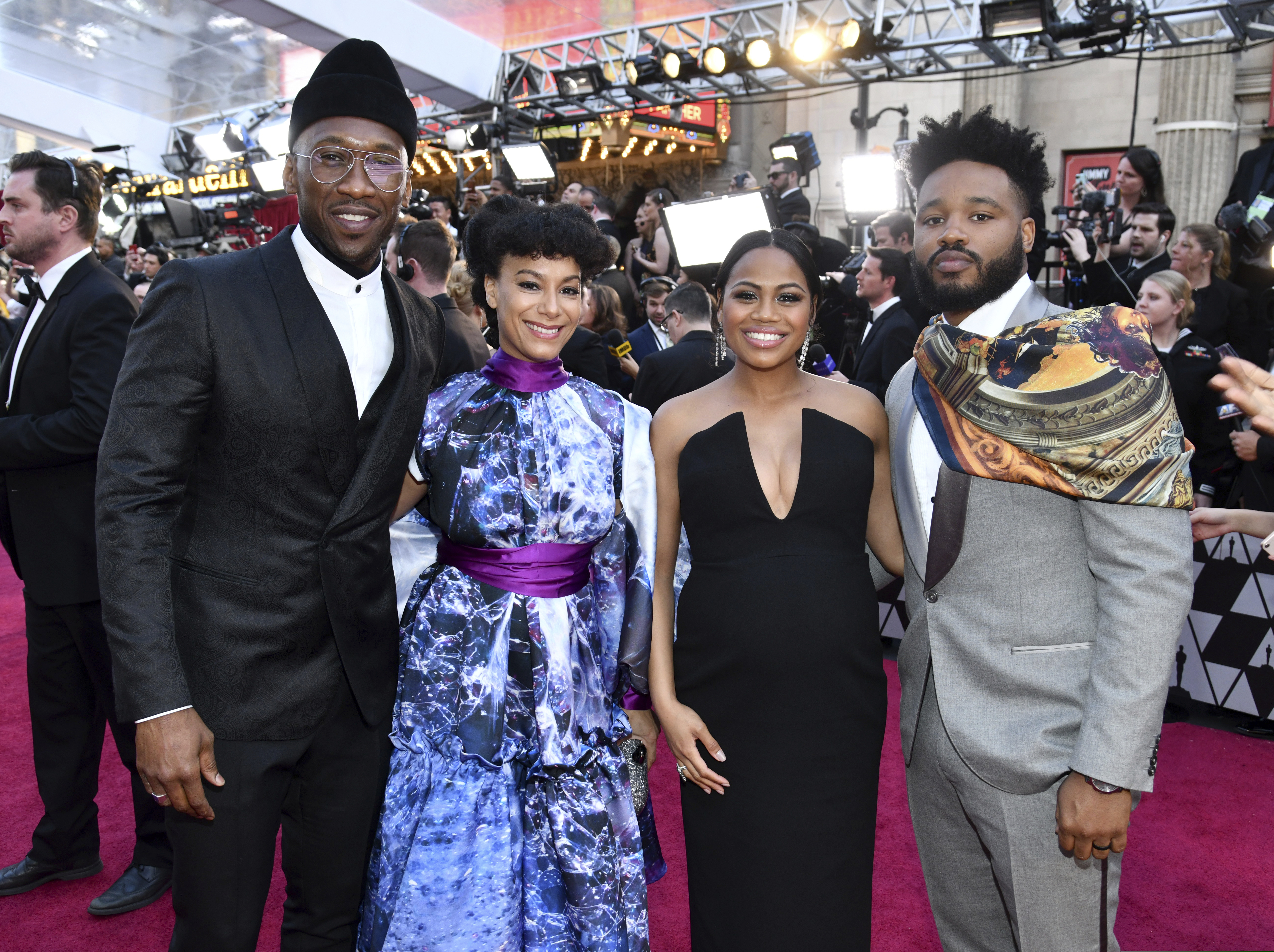 Mahershala Ali, from left, Amatus Sami-Karim, Zinzi Evans and Ryan Coogler arrive at the Oscars on Sunday, Feb. 24, 2019, at the Dolby Theatre in Los Angeles. (Photo by Charles Sykes/Invision/AP)