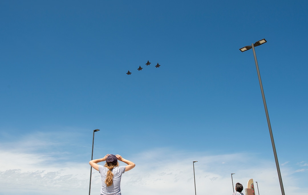 (Chris Samuels | The Salt Lake Tribune) People watch as a U.S. Air Force F-35 Demonstration Team flies over the Salt Lake Valley in Cottonwood Heights, Thursday, April 30, 2020.