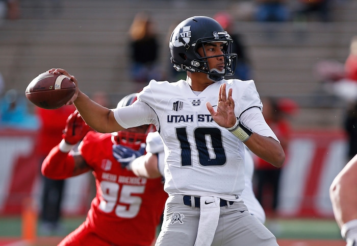 Utah State quarterback Jordan Love (10) throws a pass against New Mexico during the first half of an NCAA college football game in Albuquerque, N.M., Saturday, Nov. 4, 2017. (AP Photo/Andres Leighton)