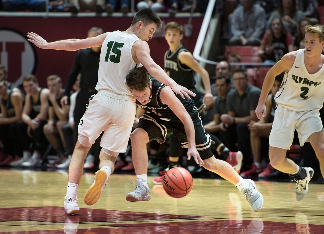 Scott Sommerdorf | The Salt Lake TribuneBountiful's David Stevenson has trouble with the defense of Rylan Jones during second half play. Olympus beat Bountiful 79-43, in a boy's 5A semi-final, FrIday, March. 2, 2018.
