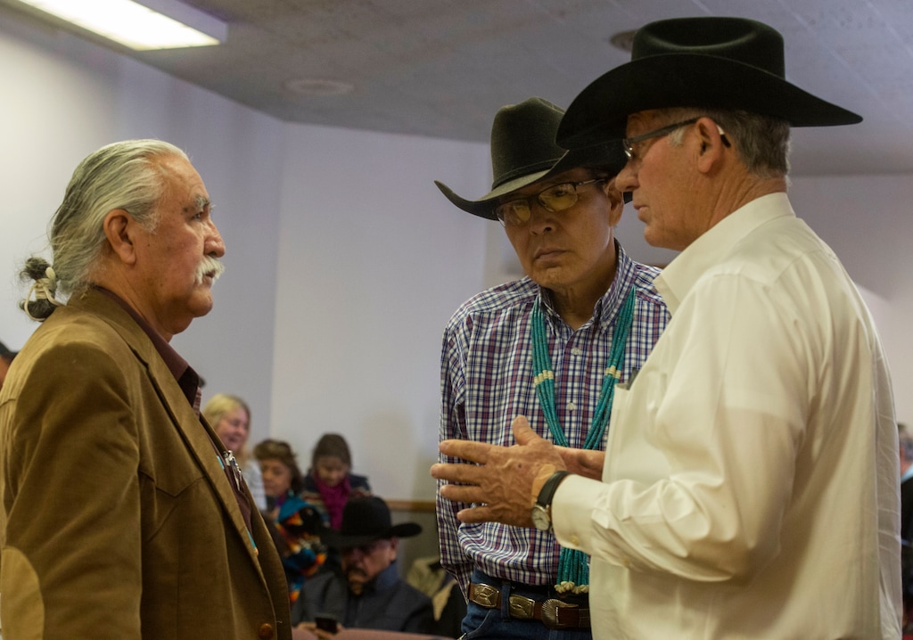 (Rick Egan | Tribune file photo)  Newly sworn in San Juan County commissioners Willie Grayeyes, Kenneth Maryboy and Bruce Adams talk together after being sworn in at the San Juan County Courthouse in Monticello on Monday, Jan. 7, 2019.
