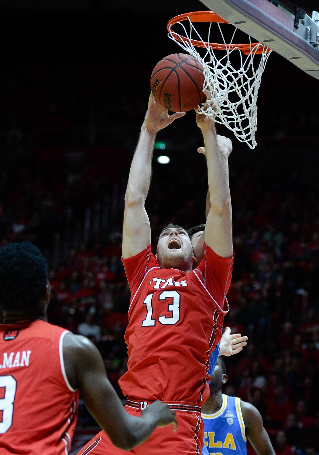 (Francisco Kjolseth  |  The Salt Lake Tribune)  Utah Utes forward David Collette (13) tries to drop one in as the University of Utah hosts UCLA in NCAA basketball at the Huntsman Center in Salt Lake City, Thursday, Feb. 22, 2018.