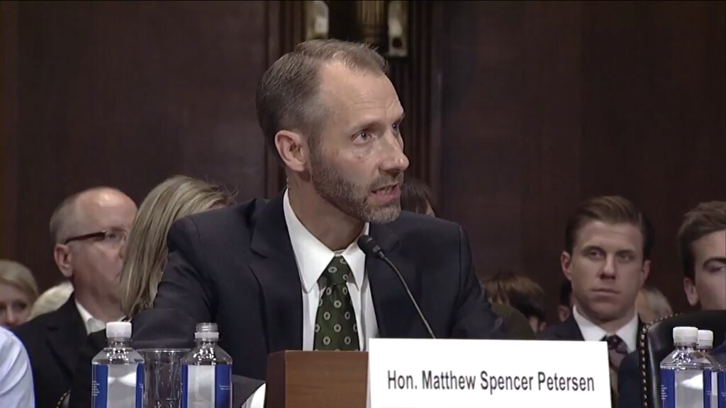 (Screen capture from Sen. Sheldon Whitehouse's Twitter account) A video of Federal Elections Commissioner Matthew Petersen, a former staffer to the late Sen. Bob Bennett and a graduate of Brigham Young University, being questioned about a possible judgeship has gone viral after he failed to answer several queries about rudimentary law by a Republican senator.
