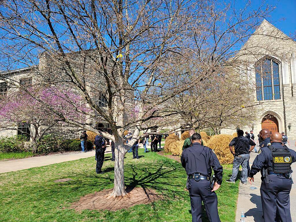 (Metro Nashville Police Department | AP) This photo provided by the Metro Nashville Police Department shows officers at an active shooter event that took place at Covenant School, Covenant Presbyterian Church, in Nashville, Tenn. Monday, March 27, 2023. Authorities say the suspect in a shooting at a private Christian school in Nashville is dead.