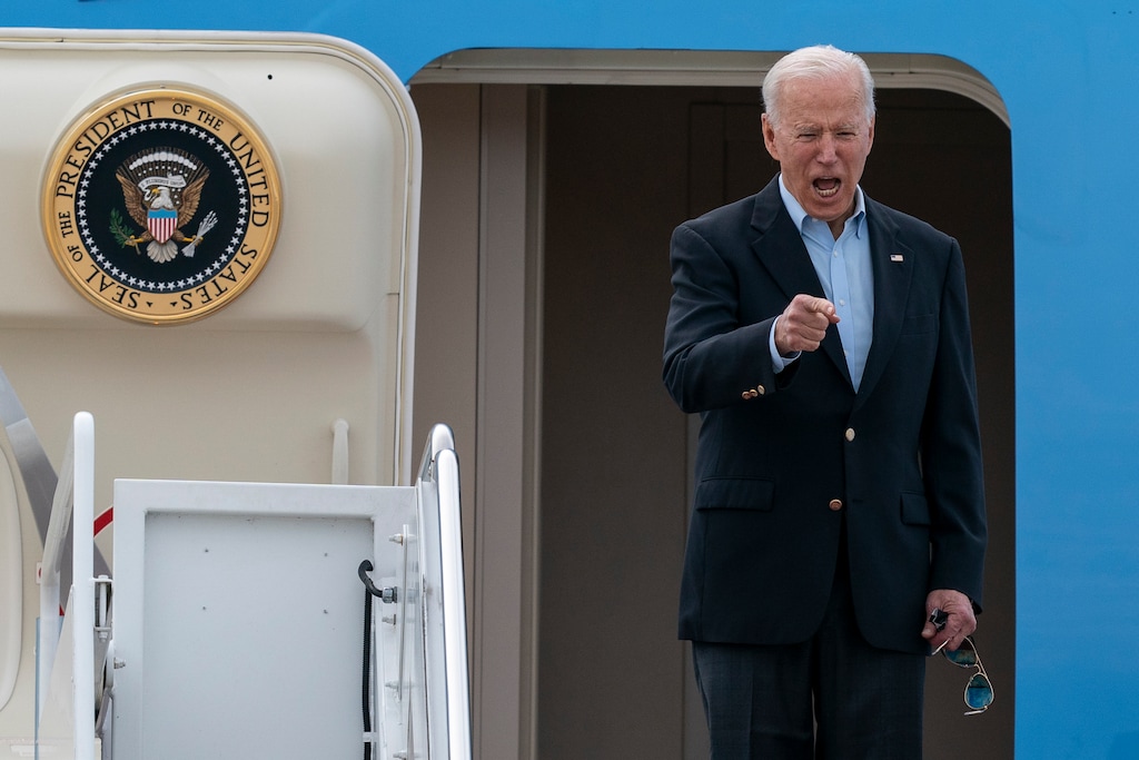 (Alex Brandon | AP) President Joe Biden points as he boards Air Force One upon departure, Wednesday, June 9, 2021, at Andrews Air Force Base, Md.