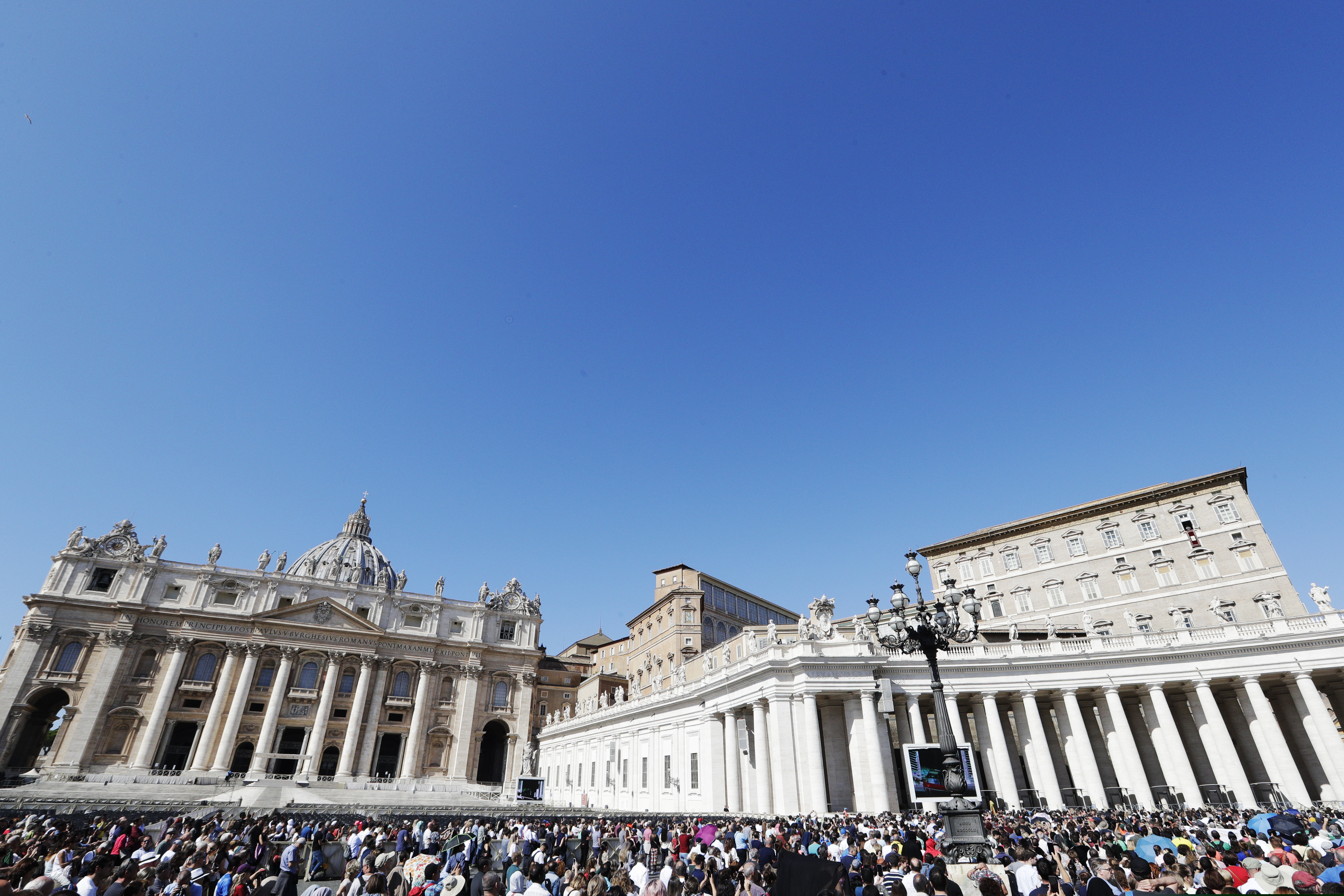 (Andrew Medichini | AP) Pope Francis, top right, delivers his blessing during the Angelus noon prayer he recited from the window of his studio overlooking St. Peter's Square, at the Vatican, Sunday, Oct. 6, 2019.