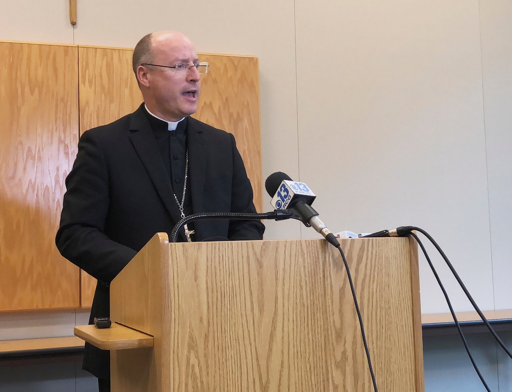 (AP Photo/Summer Ballentine) Bishop W. Shawn McKnight, of the Roman Catholic Diocese of Jefferson City, Mo., speaks at a news conference Thursday, Nov. 8, 2018. McKnight released a complete list of the names of 33 priests or religious brothers in the Jefferson City diocese have been "credibly accused" and/or removed from the ministry over sexual abuse of minor. This follows an internal investigation that began in February 2018.