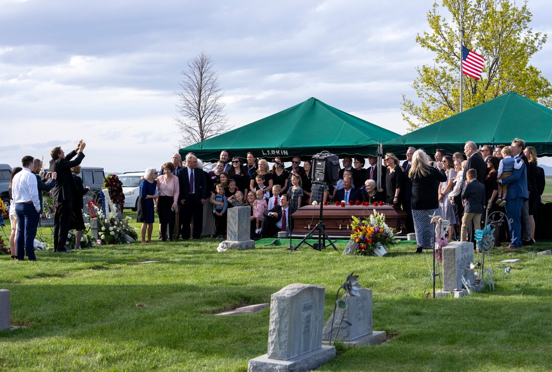 (Rick Egan | The Salt Lake Tribune)  The family gathers for a photo at the grave side of Orrin Hatch, at the Newton Cemetery, on Friday, May 6, 2022.