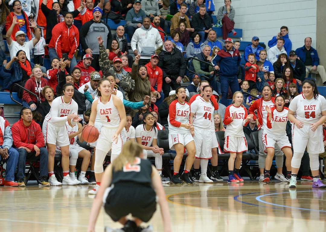 (Leah Hogsten  |  The Salt Lake Tribune) Timpview's Madelyn Boulton (02) hit the deck trying to steal from East's Margarita Satini (02).  East defeated Timpview 68-48 to win the the 5A High School Girls' Basketball Tournament title at SLCC in Taylorsville, Saturday, Feb. 24, 2018. 