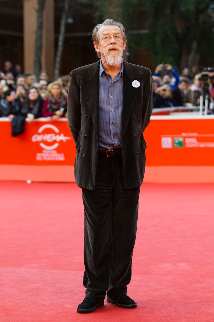 File- This Nov. 8, 2013, file photo shows actor John Hurt walking on the red carpet at the 8th edition of the Rome International Film Festival in Rome. The great and versatile actor Sir John Hurt, who could move audiences to tears in “The Elephant Man,” terrify them in “Alien,” and spoof that very same scene in “Spaceballs,” has died at age 77. Hurt, who battled pancreatic cancer, passed away Friday, Jan. 27, 2017, in London according to his agent Charles McDonald. (AP Photo/Alessandra Tarantino, File)