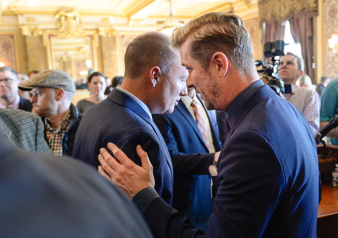 (Francisco Kjolseth  |  The Salt Lake Tribune)  Lt. Gov. Spencer Cox, left, who directly acknowledged the heightened suicide risk faced by LGBTQ kids, speaks with Troy Williams, executive director of Equality Utah following an announcement of the creation of a community teen suicide prevention task force to combat the state's rising youth suicide problems.