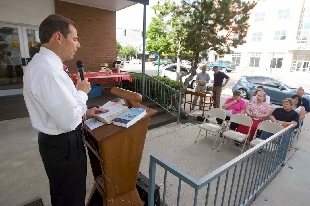 (Tribune file photo)  Provo mayor John Curtis reads from the Book of Genesis chapters 37-41 at Provo Community United Church of Christ's first annual Freedom Bibl-A-Thon on  Friday, July 2,2010.