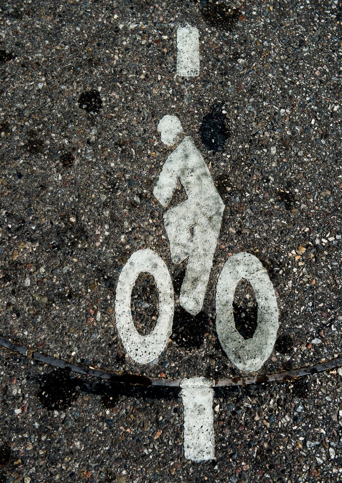 (Rick Egan  |  The Salt Lake Tribune)      Salt Lake City has installed ten traffic signal detectors, which use a radar device that is triggered by people riding bicycles. If the bicyclist stops near the bike painted in the road, they will be detected and the light will change, when no traffic is around. Wednesday, Aug. 1, 2018.


