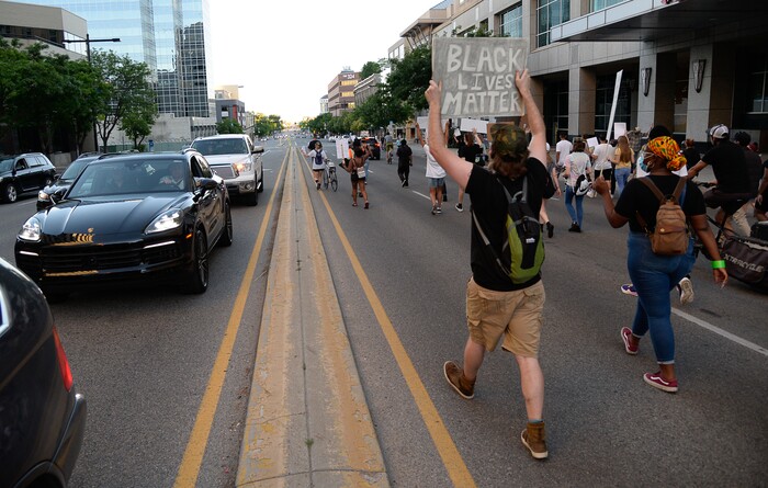 (Francisco Kjolseth  |  The Salt Lake Tribune) Protesters march the streets of downtown Salt Lake City to rally against police brutality on Friday, June 26, 2020.