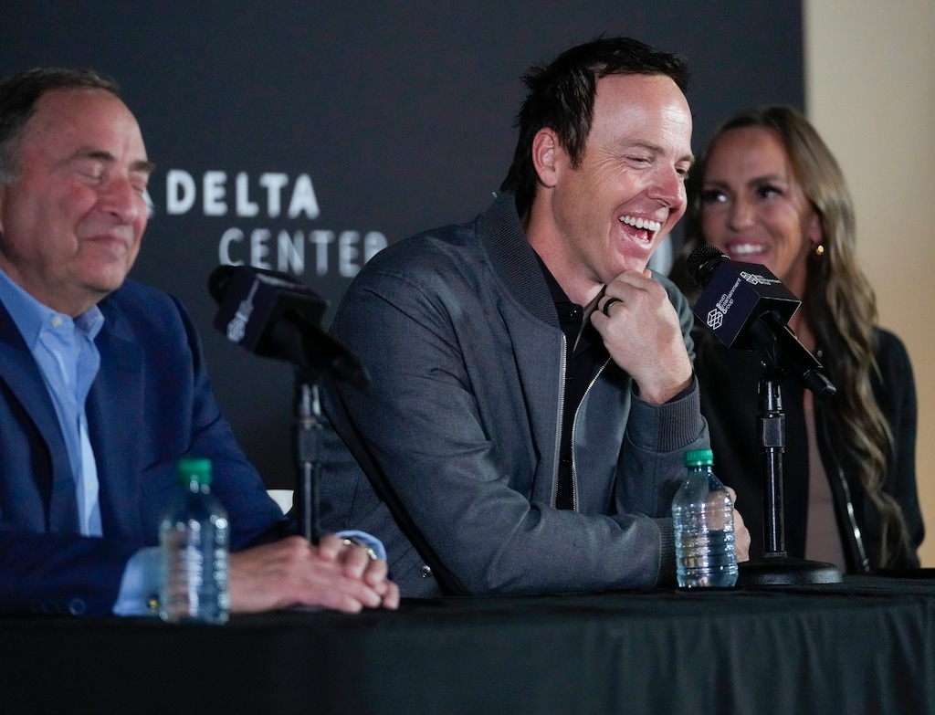(Bethany Baker  |  The Salt Lake Tribune) SEG owner Ryan Smith laughs during a press conference announcing a new National Hockey League team owned by Smith Entertainment Group at the Delta Center in Salt Lake City on Friday, April 19, 2024.