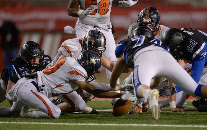 (Francisco Kjolseth  |  The Salt Lake Tribune)  Mountain Crest battles Stansbury during a fumble in their class 4A semifinal game at Rice-Eccles Stadium, Thursday, Nov. 9, 2017.