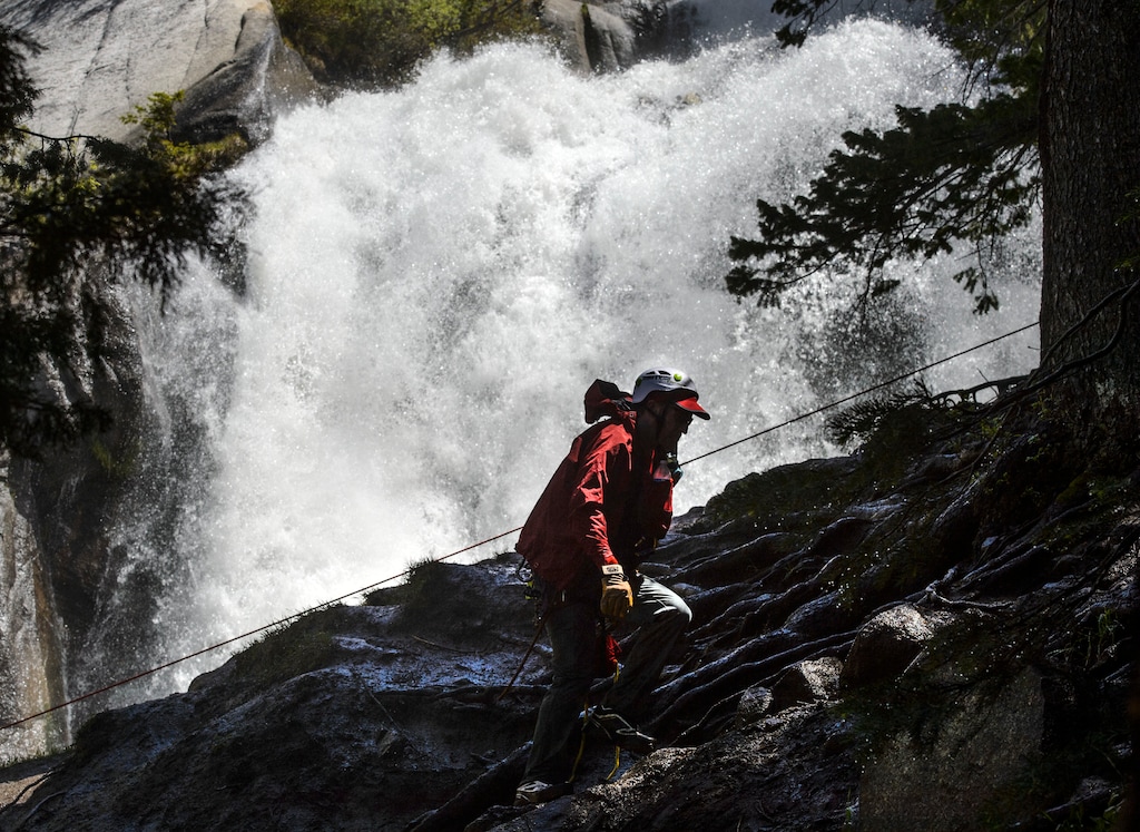 Steve Griffin | The Salt Lake Tribune
Search and Rescue crews secure themselves as they work to free the body of a man who fell into the runoff-swollen waters of Bell Canyon Creek in June of 2017. “Now is not the time to be near any water” officials warn this year as waterways near Bell Canyon, Bridal Veil Falls run fast and cold.